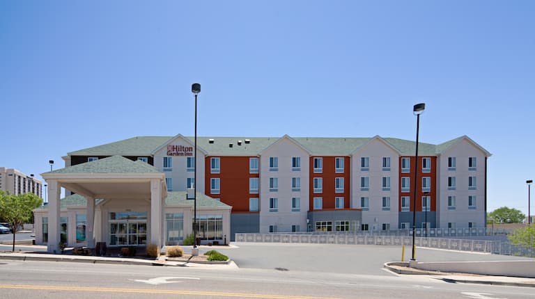 Hotel exterior with entrance in daytime