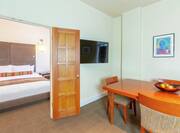 King Boardroom Suite with Bed and Room Technology