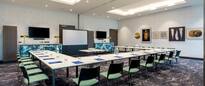 Meeting Room Setup in U Style with Projection Screen and 2 HDTVs
