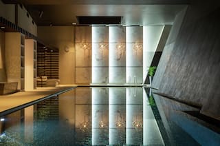 Large Indoor Heated Pool with seating