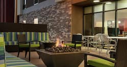 Outdoor Patio with Fire Pit and Lounge Area 