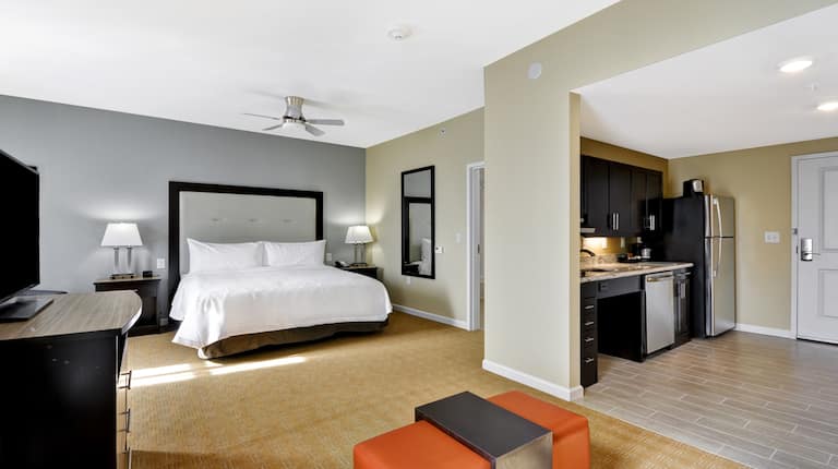 One King Bed Guest Bedroom with HDTV and Kitchen Area