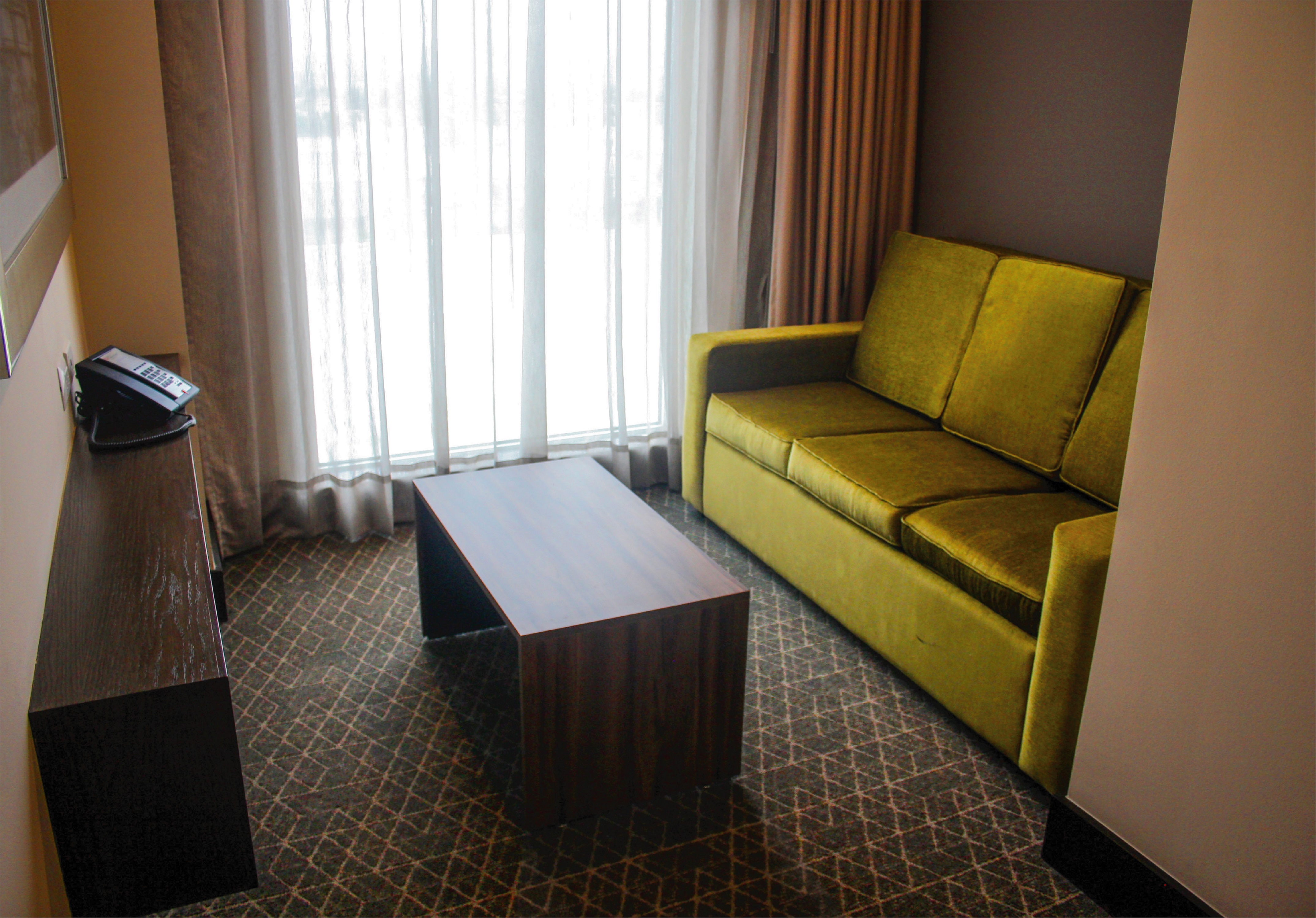 Junior Suite Guestroom with Sofabed and Phone