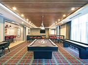 Game Room with Pool Table and Shuffleboard Table