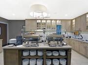 Breakfast Buffet Area with Food Preparation Counter