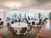 Spacious Ballroom Dining Area with Projector Screen 