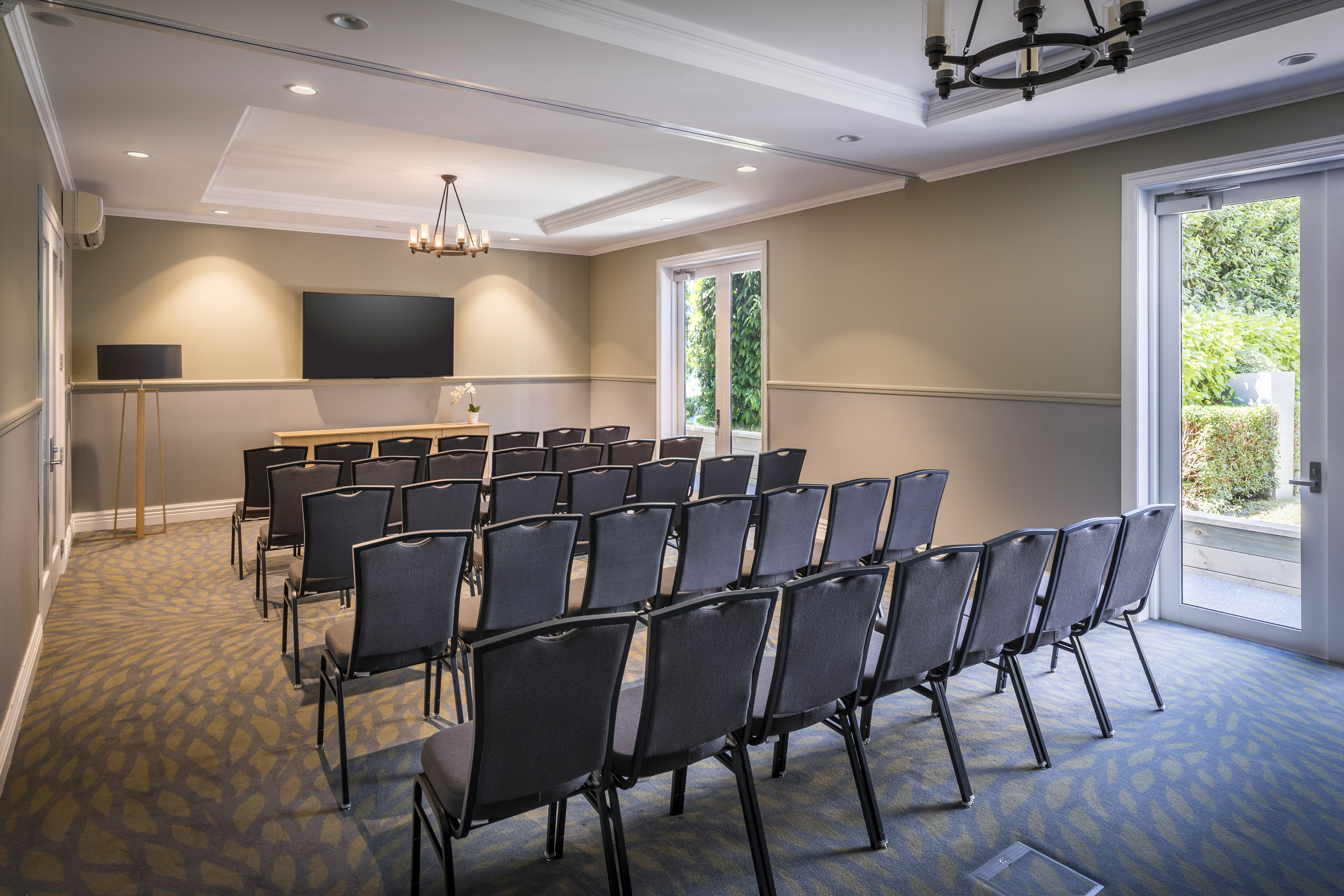 Meeting Room Theatre Setup with Wall Mounted HDTV