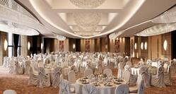 Spacious Ballroom Area with Round Tables and Chairs
