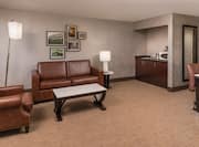Lounge area with comfortable seating and work desk