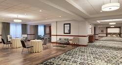 Spacious ballroom foyer featuring comfortable and view into ballroom space.