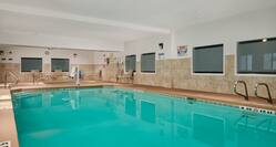 Indoor Pool and Whirlpool Area with Seats