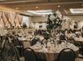 Ballroom Wedding Reception Setup with Roundtables and Chairs