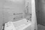 Accessible Bathroom Tub with Bench and Handrails