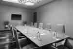 Boardroom with Meeting Table, Office Chairs and Wall Mounted HDTV