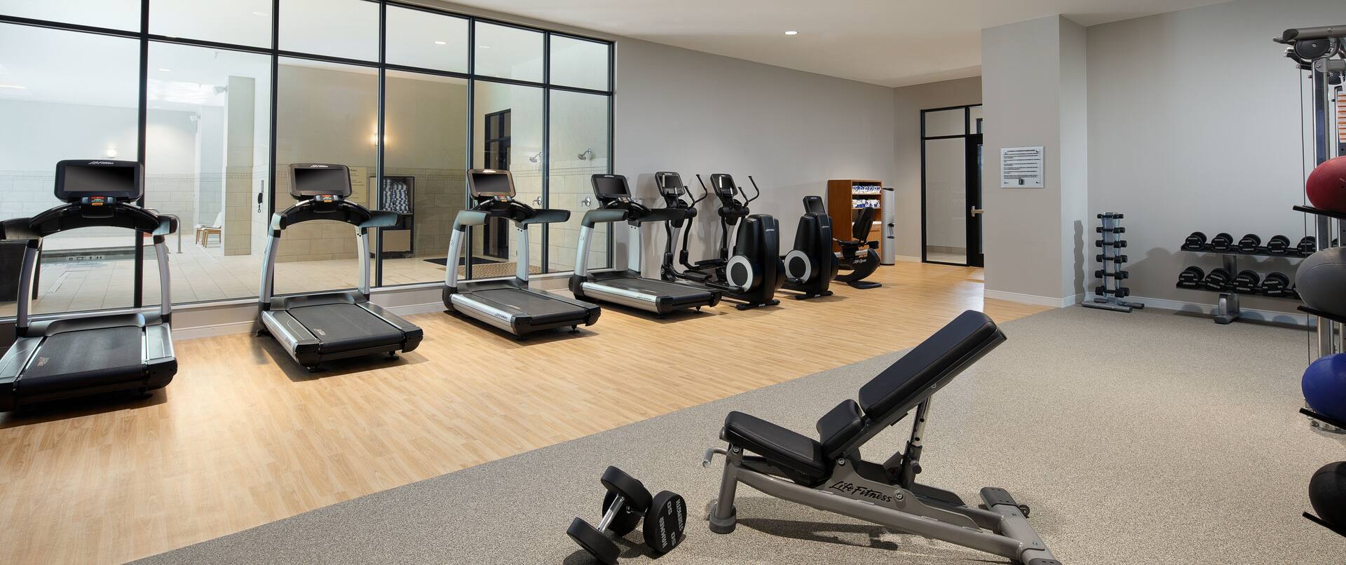 Fitness Center with Treadmills, Cross-Trainer and Weight Bench
