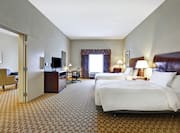 Suite with Two Queen Beds, Lounge Area, Work Desk, and Room Technology