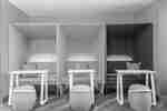 Quiet Pods with Desk and Tables in Lobby