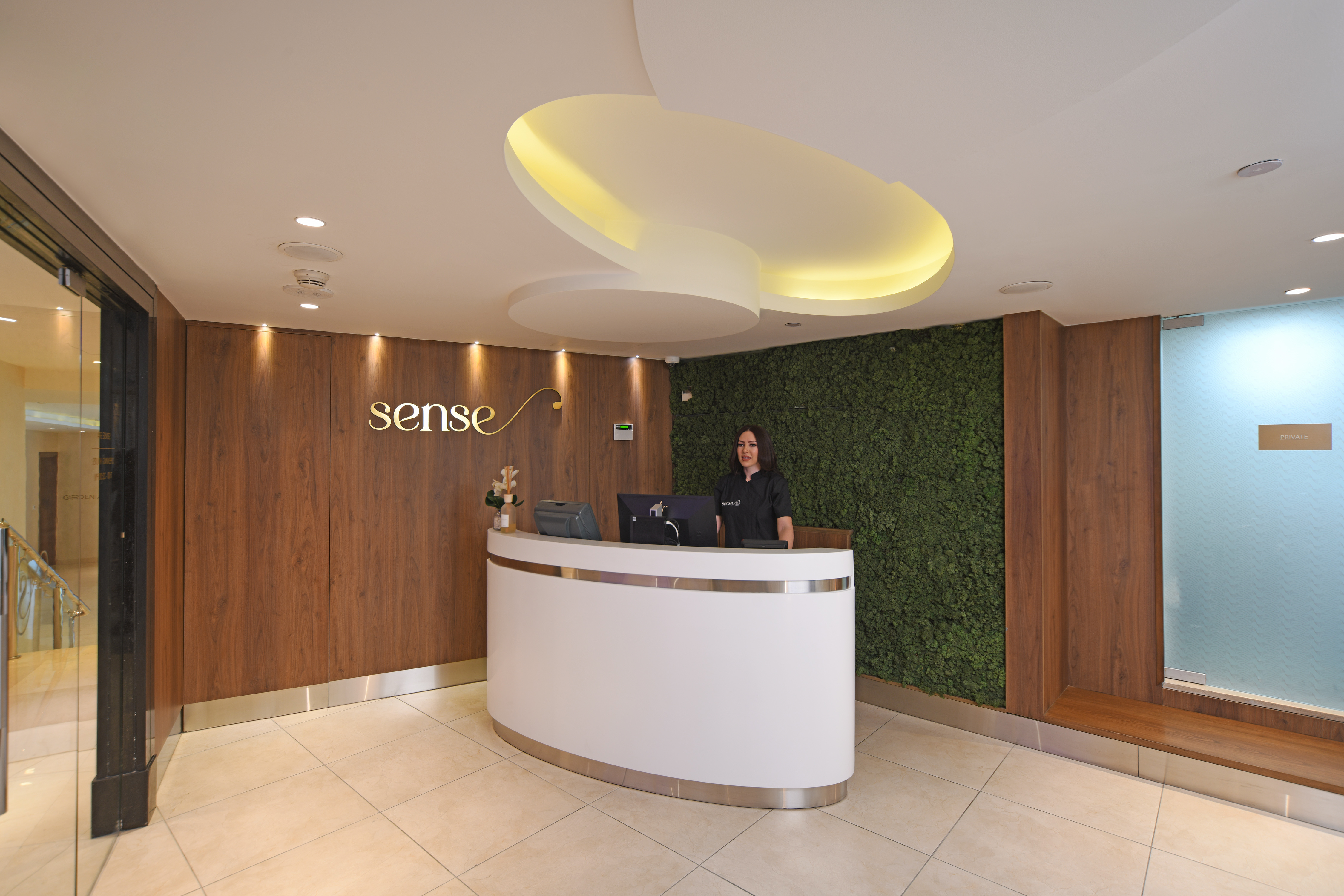 spa reception area with team member