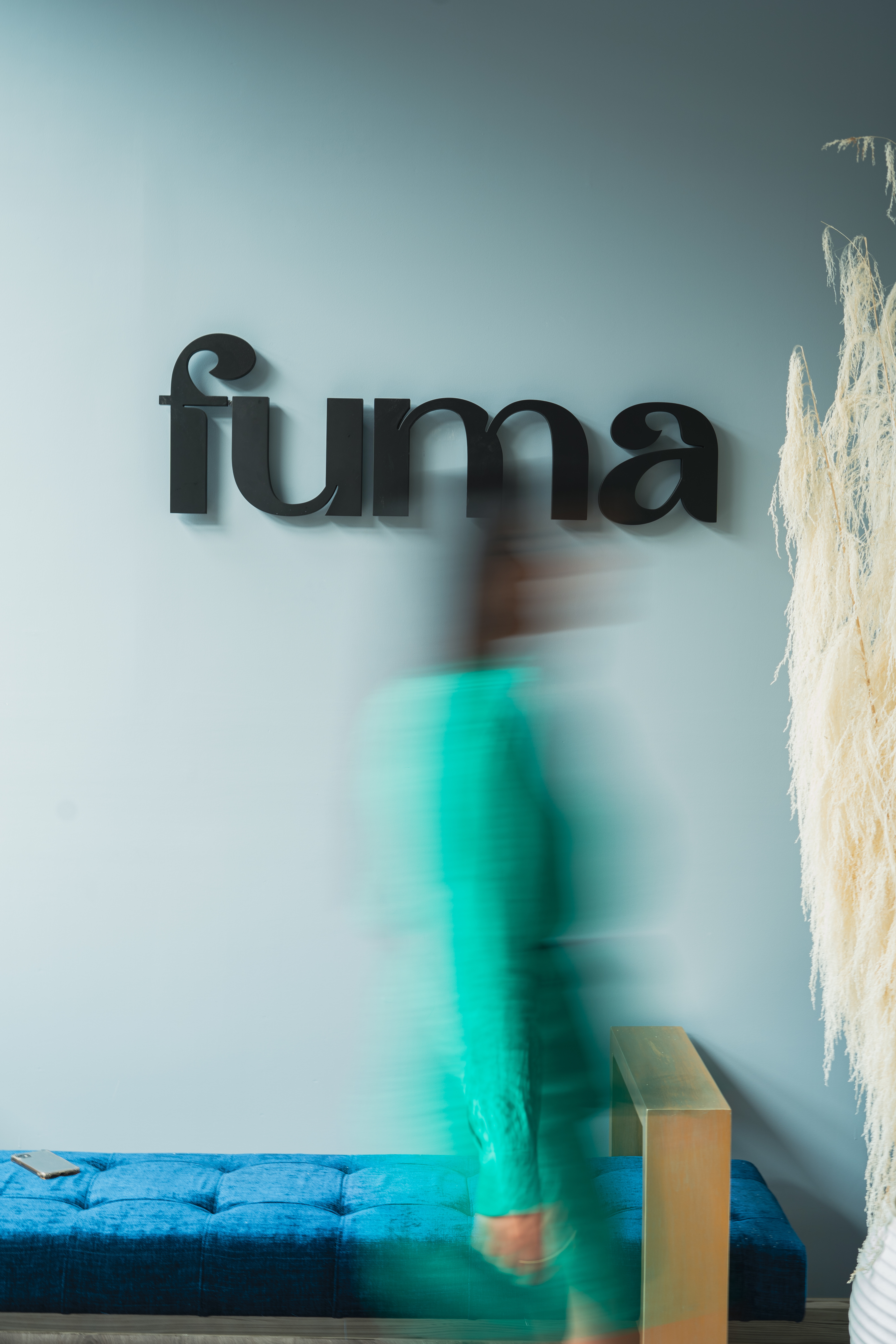 Fuma restaurant entry with sign