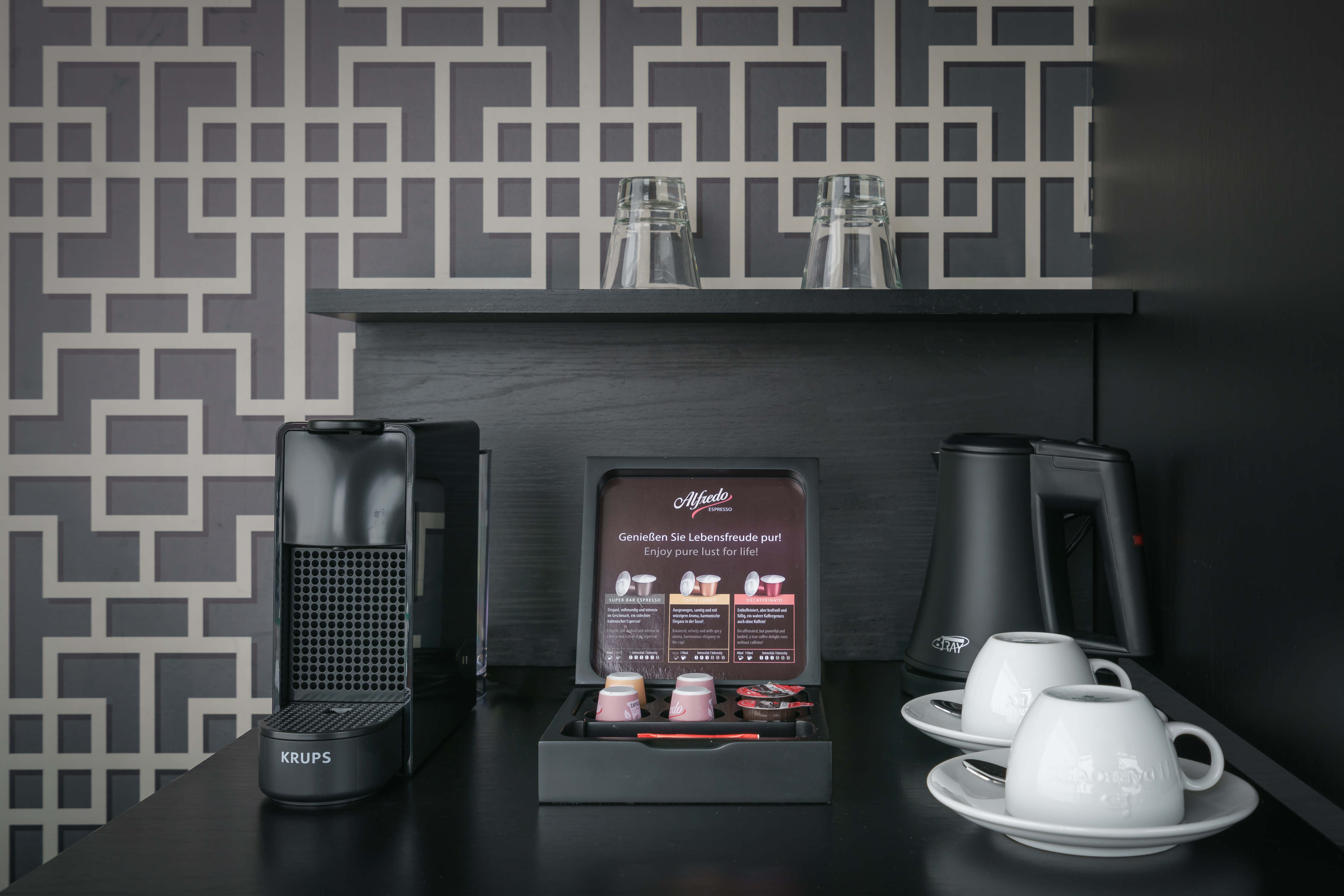 Coffeemaker and Cups in a Guest Room