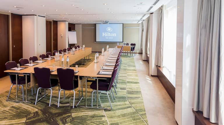 Meeting Room with Projection Screen Setup U Style