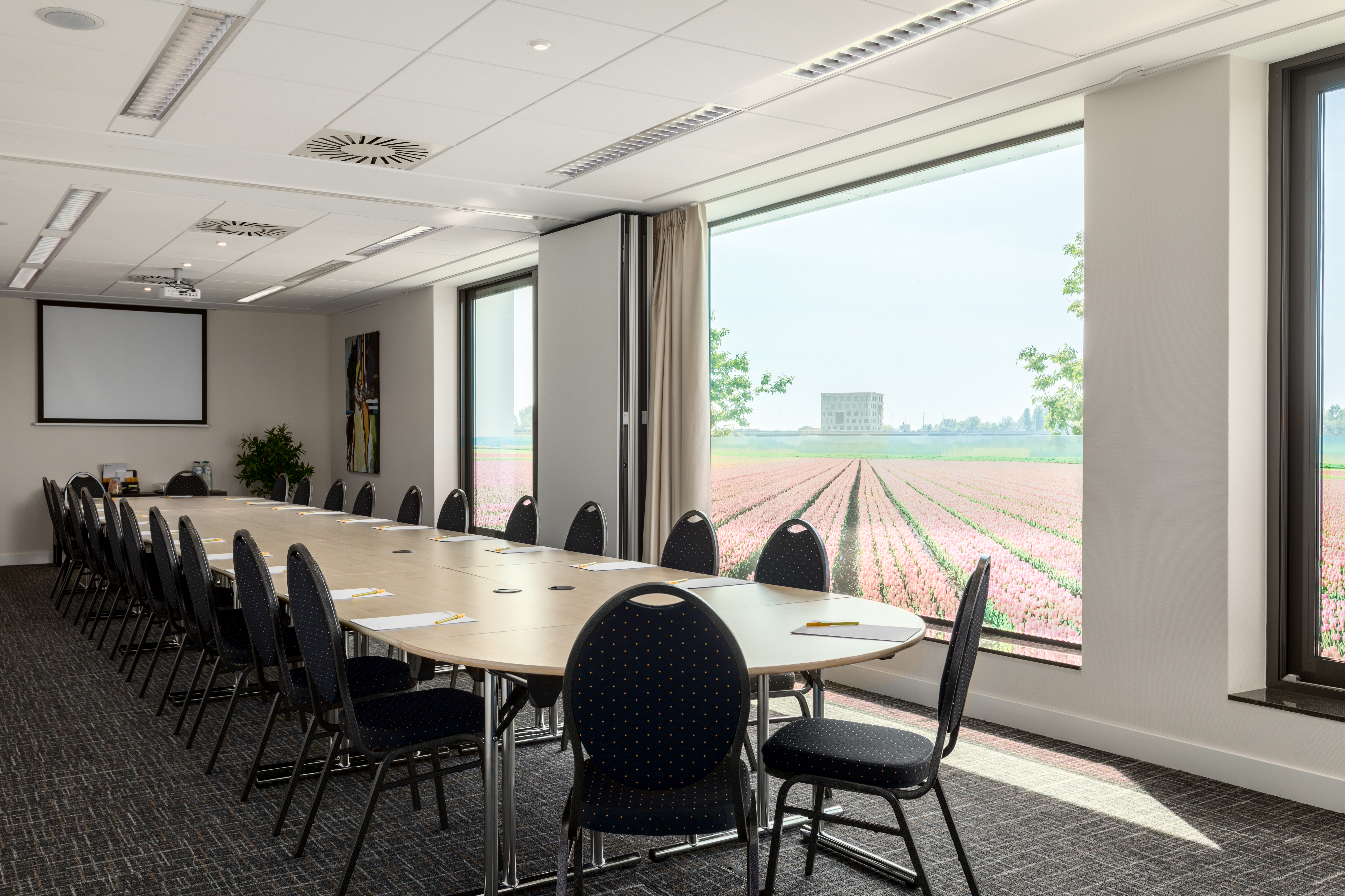 Meeting Room with long conference table.