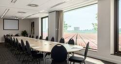 Meeting Room with long conference table.