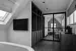 Spacious Guestroom with Separate Bedroom and Lounge Spaces