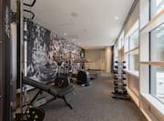 Fitness Center with Weight Machine, Cycle Machine, Cross-Trainer and Dumbbell Rack