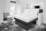 Bed and seating area in a guest room