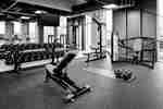 Fitness center with weights, tv and strength equipment