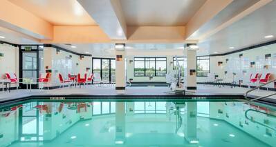 Indoor pool and deck seating.