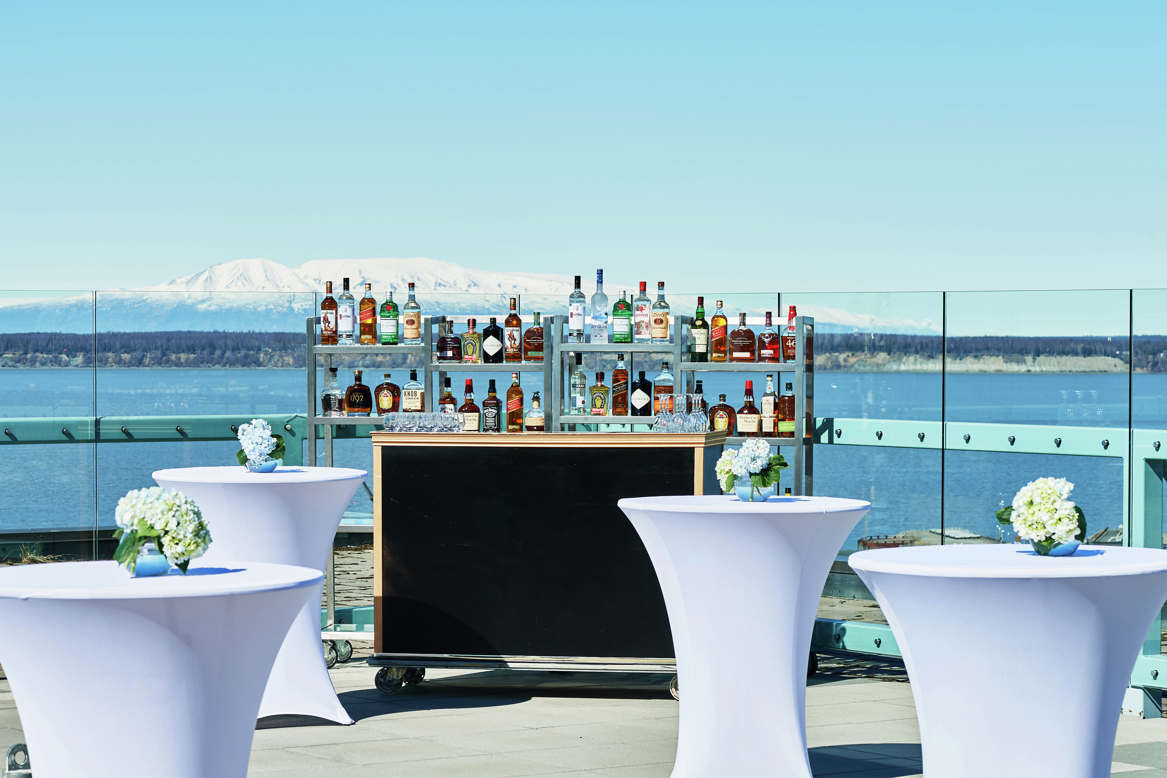Outdoor Meeting Space with Bar Area and Water Views