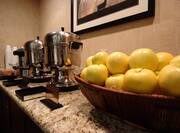 Complimentary Coffee and Beverage Bar with Fresh Fruit 