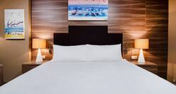 Guest Room, King Bed, Night Tables, Lamps, Wall Art