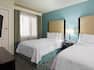 2 Queen Beds Suite with two Queen Beds and tv