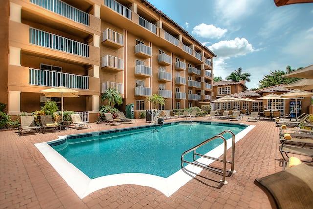 Outdoor swimmping pool with sun loungers
