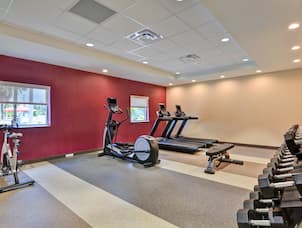 fitness center with weights and machines