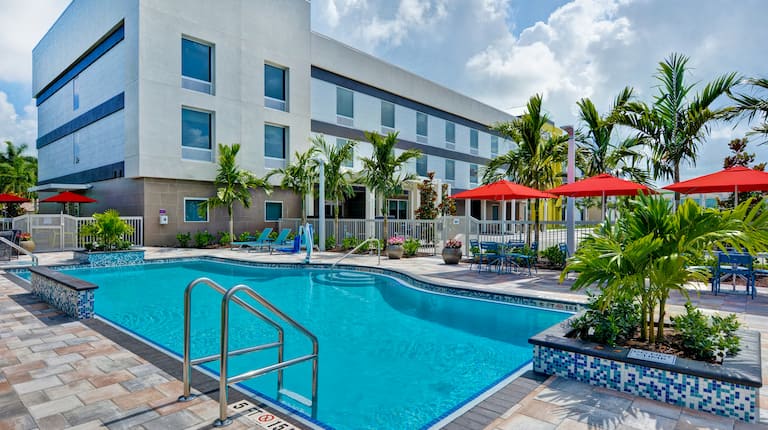 exterior view of hotel and outdoor pool