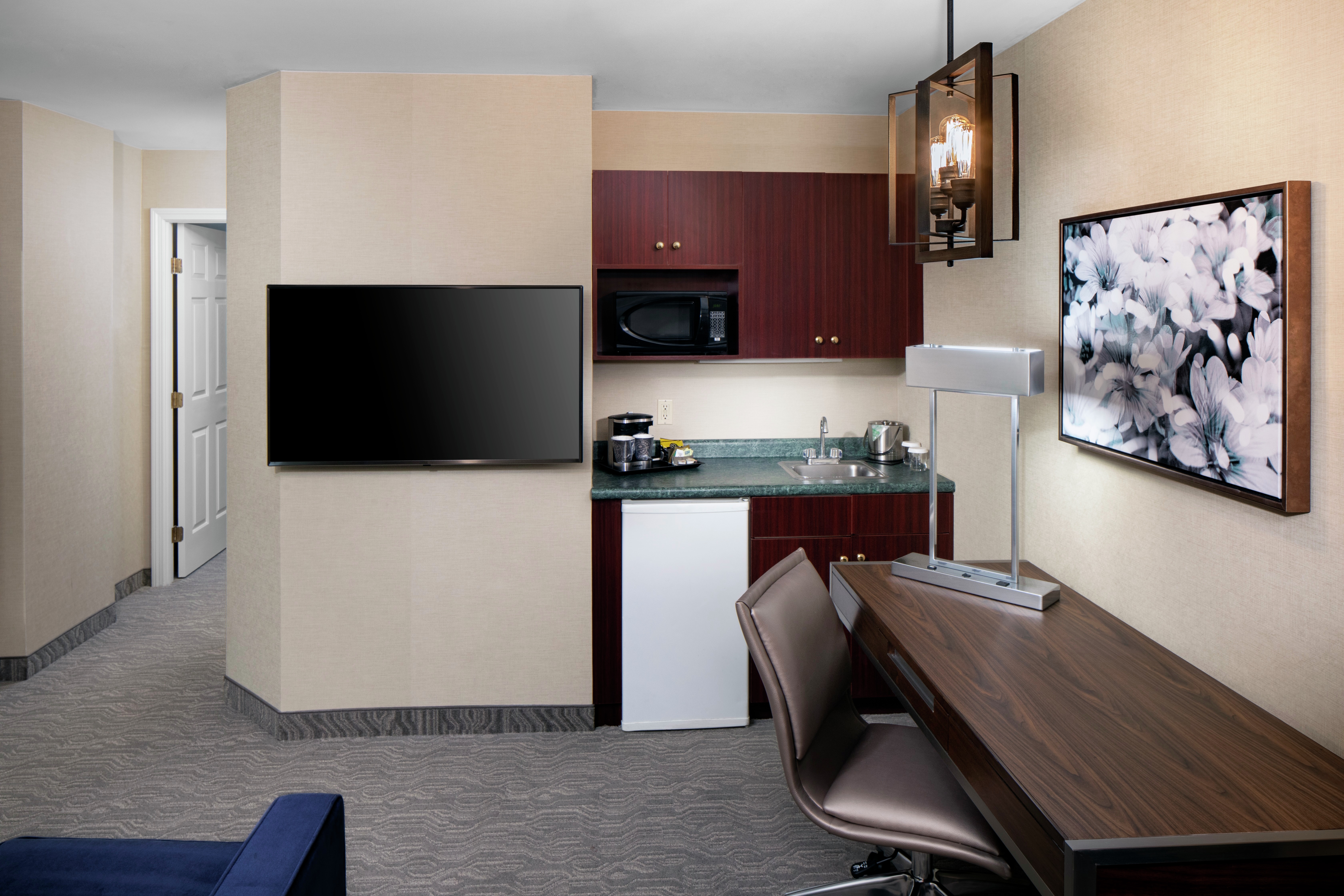 Suite Living Area with Kitchenette and Flat Screen TV