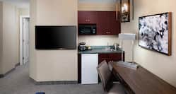 Suite Living Area with Kitchenette and Flat Screen TV