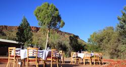 Round Tables With White Cloths Set For Dinner Event at Alice Springs Desert Park 