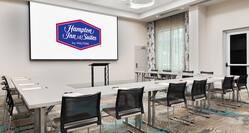Holms Ballroom With U-Shaped Table and Chairs, Presentation Screen, and Podium