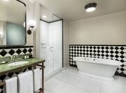 Suite Bathroom with Walk-In Shower and Bathtub