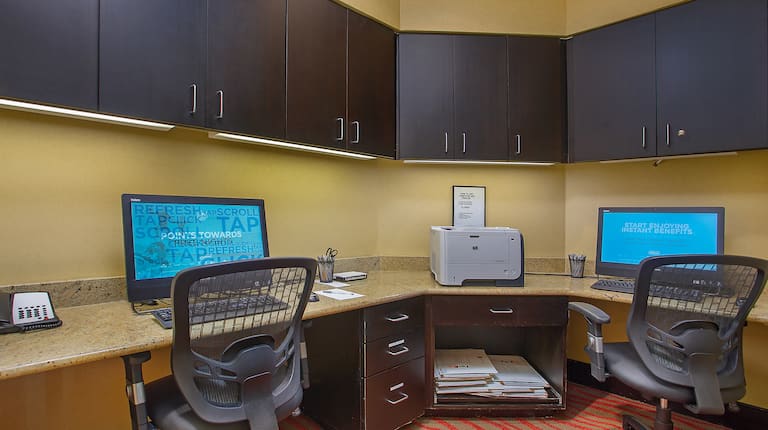 Business Center with Two Desktop Computers, Two Office Chairs and Printer