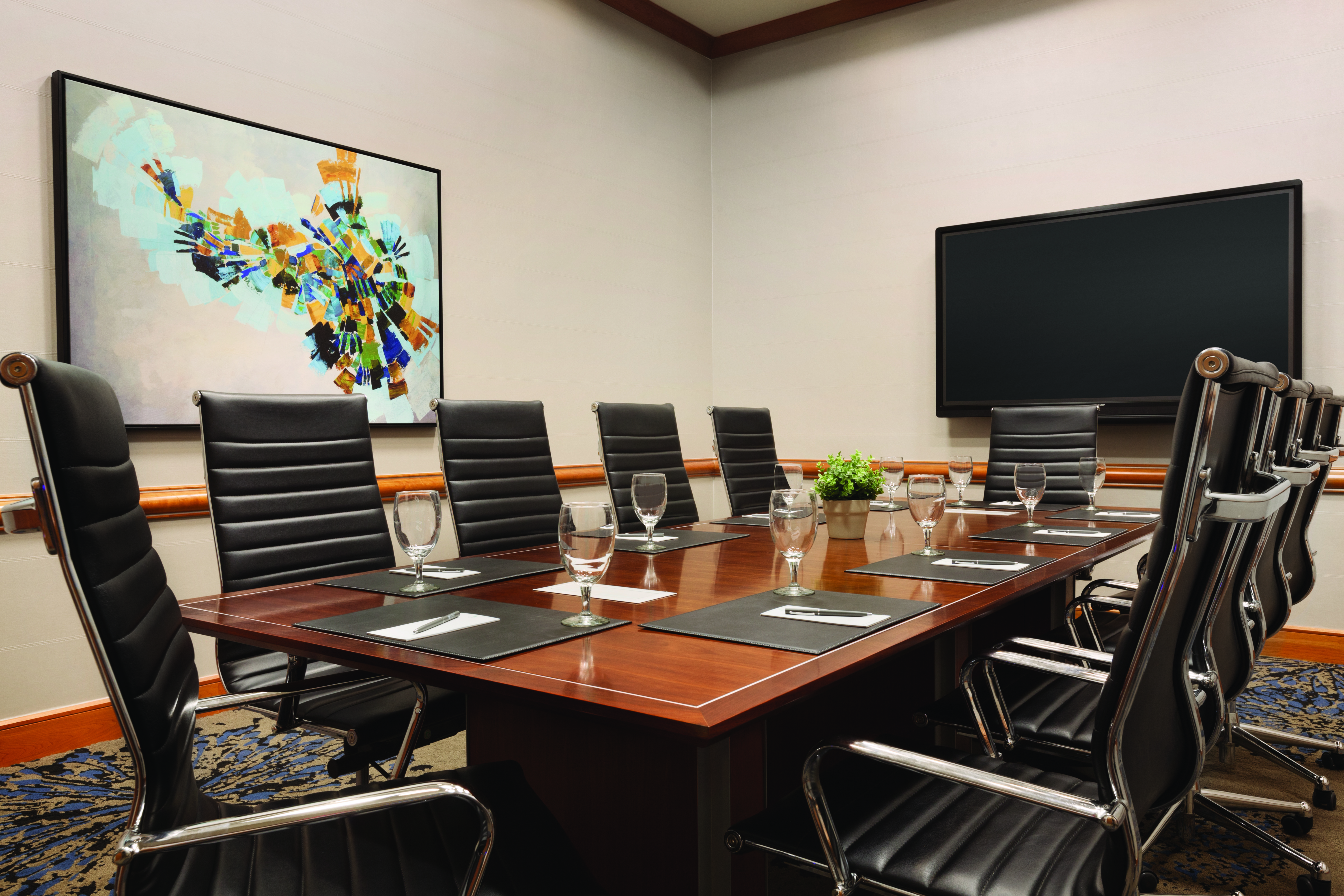 Boardroom Meeting Table, Office Chairs and Wall Mounted HDTV