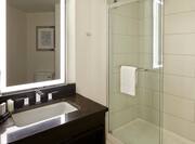 Studio Suite Bathroom with Vanity and Walk-In Shower