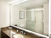 Suite Bathroom with Vanity and Glass Door Shower