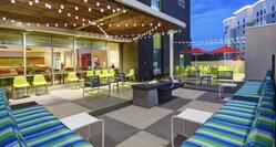 hotel with outdoor patio with firepit