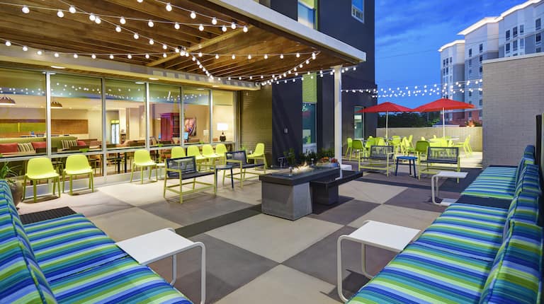 hotel with outdoor patio with firepit